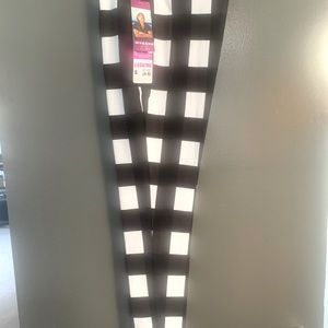 Leggings with black and white plaid pattern.  Sample for sale.